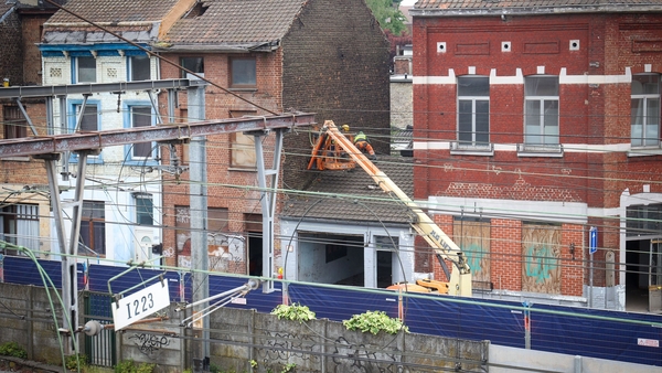 The rundown cluster of buildings is in the city of Charleroi