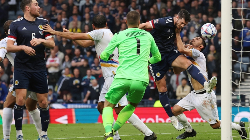 Scott McKenna heads home Scotland's second goal