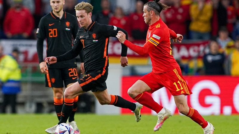 Frenkie de Jong of The Netherlands chase by Gareth Bale of Wales