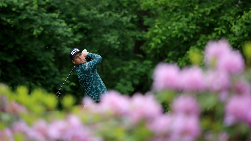 Caldwell playing his tee shot at the third hole