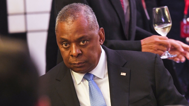 US Defence Secretary Lloyd Austin listens to China's Defence Minister Wei Fenghe at the ministerial roundtable luncheon at the Shangri-La Dialogue summit in Singapore on 11 June
