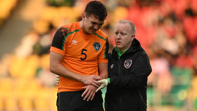 Oisin McEntee is helped from the pitch last week by team doctor Mortimer O'Connor