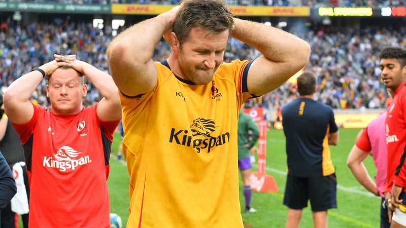 Alan O'Connor and team-mates at the final whistle