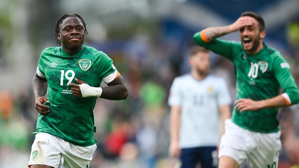 Michael Obafemi celebrates after scoring against Scotland
