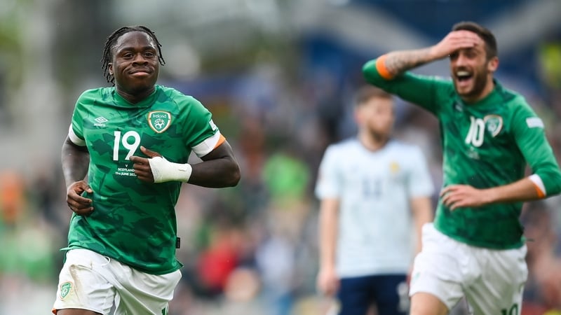 Michael Obafemi celebrates after scoring against Scotland