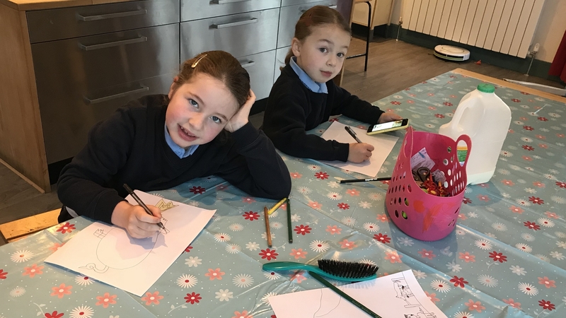 Nellie and Eppie drawing pictures of stories in December 2017
