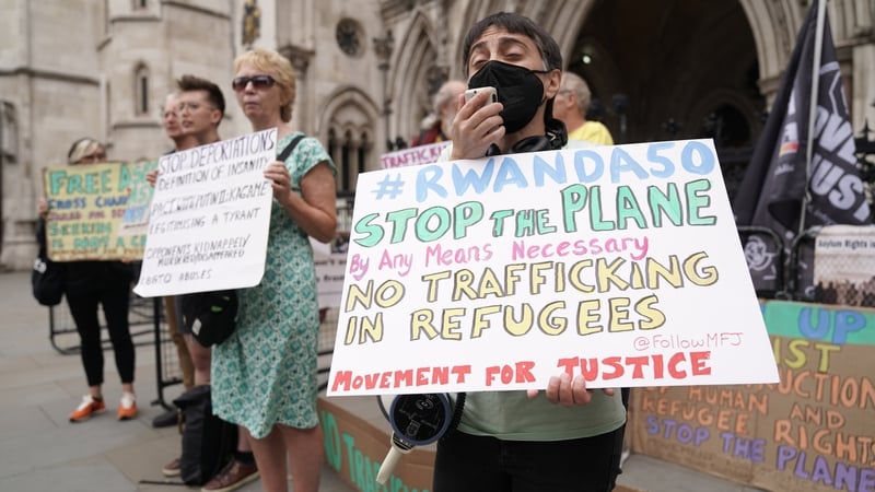 Protesters outside the Royal Courts of Justice in London today