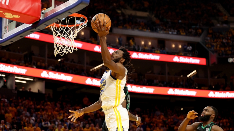 Andrew Wiggins of the Golden State Warriors drives to the basket