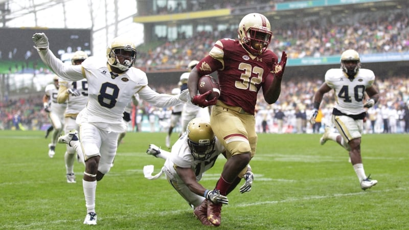 Jon Hillman of Boston College scores a touchdown despite the tackle of Lance Austin and Step Durham of Georgia Tech at the Aer Lingus College Football Classic Ireland at Aviva Stadium in 2016. Photo: Patrick Bolger/Getty Images
