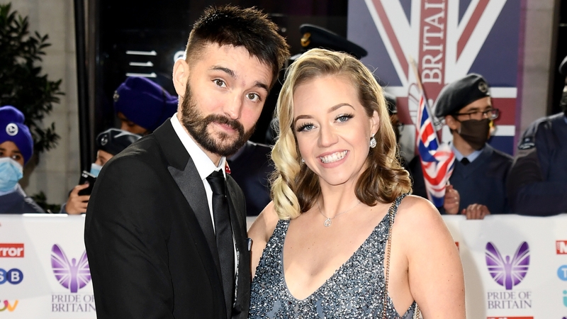 Tom and Kelsey Parker pictured together in 2021