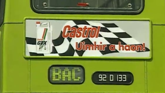 A Dublin Bus carrying advertising in Irish, 1992.