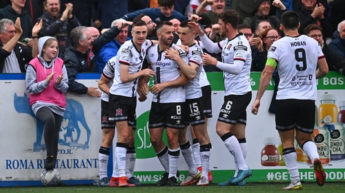 Goalscorer Robbie Benson is congratulated by his Dundalk team-mates