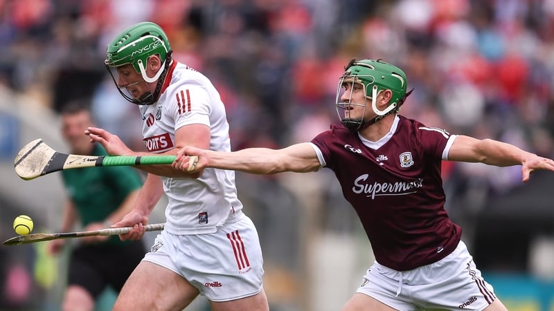 Jack Grealish (R) chases down Robbie O'Flynn of Cork