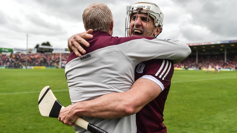 Daithí Burke of Galway celebrates with manager Henry Shefflin at the full-time whistle in the victory over Cork