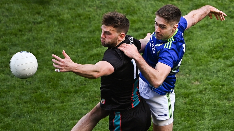 Aidan O'Shea and Adrian Spillane battle for possession in April's league final
