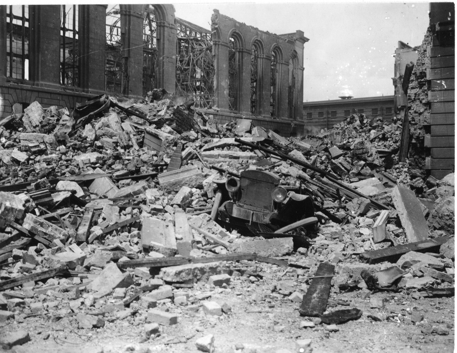 The scene of the explosion, with the burnt-out Public Records Office in the background. Image courtesy of the Irish Architectural Archive