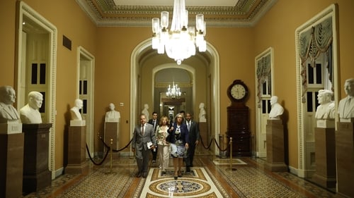 Democrats walk to the Senate Chamber to watch the vote on the Bipartisan Safer Communities Act