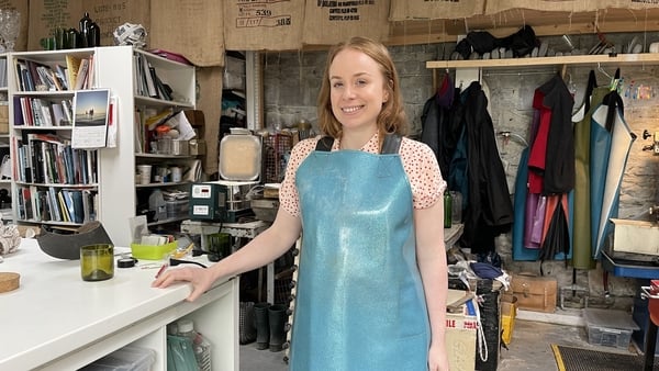 Glass artist Sinéad Brennan creates drinking glasses out of waste bottles at her studio in Sandymount in Dublin