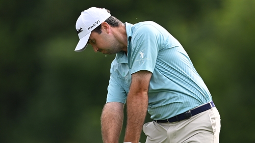Niall Kearney plays his approach shot on the third hole at the BMW International