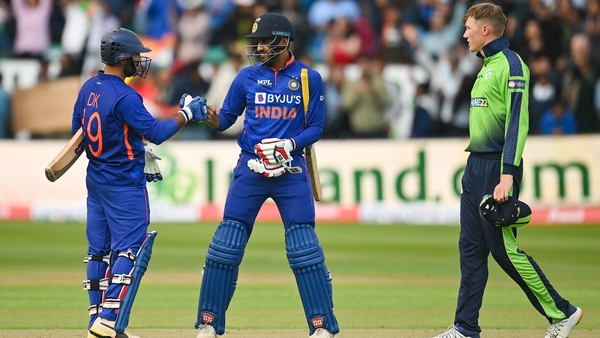 Dinesh Karthik, left, and Deepak Hooda after their side's victory in Malahide