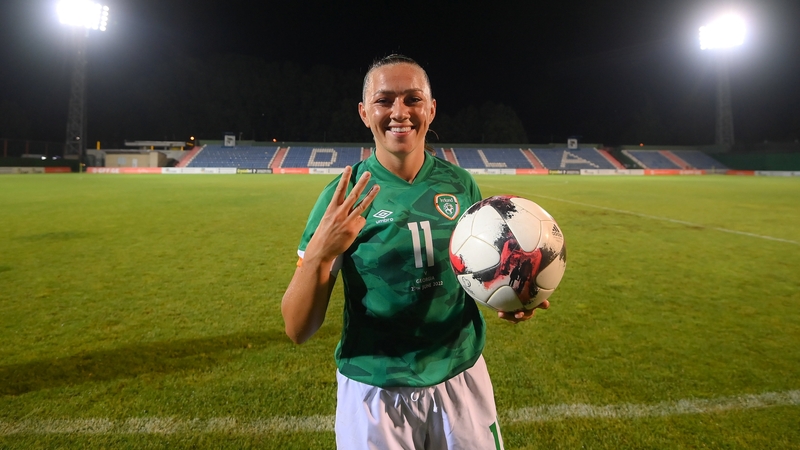 Katie McCabe celebrates with the match ball after her hat-trick in the 9-0 win over Georgia