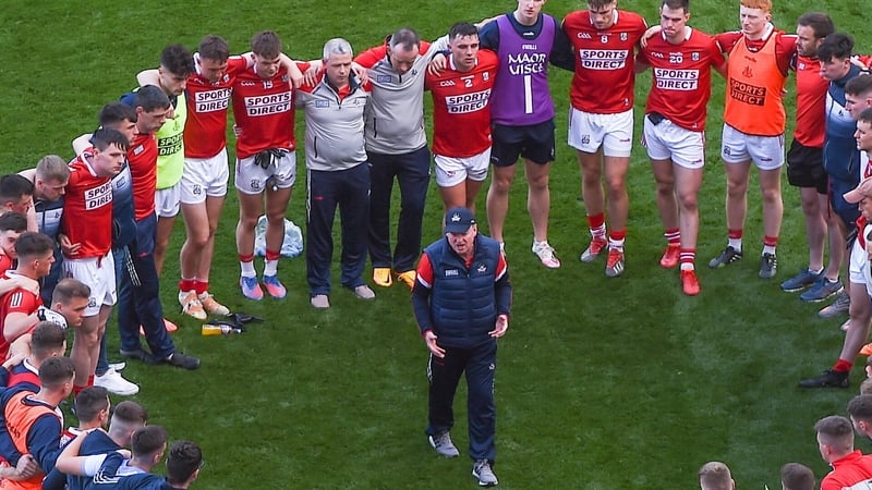 John Cleary speaks to his players after Cork's defeat by Dublin
