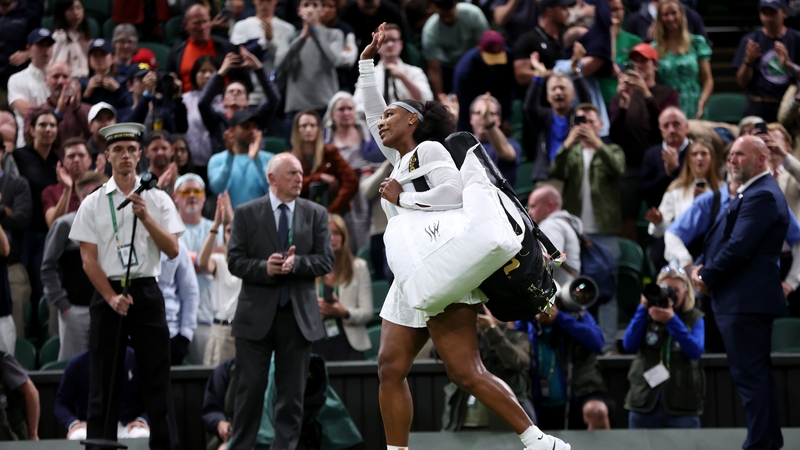 Serena Williams waves to the Centre Court crowd after her defeat