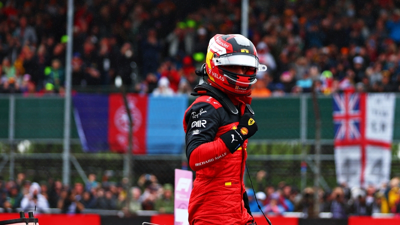 Carlos Sainz celebrates after securing pole position for the British Grand Prix