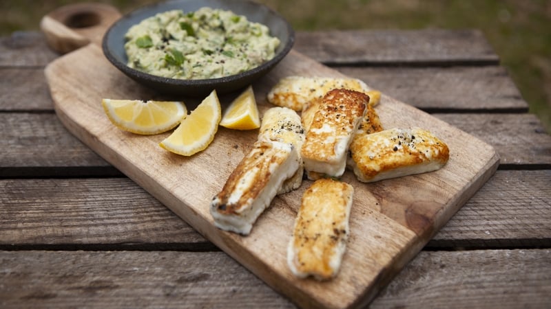 Moreish and indulgent halloumi is brightened up with this tangy avocado dipping sauce.
