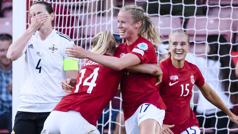 Julie Blakstad of Norway (R) celebrates her goal against Northern Ireland