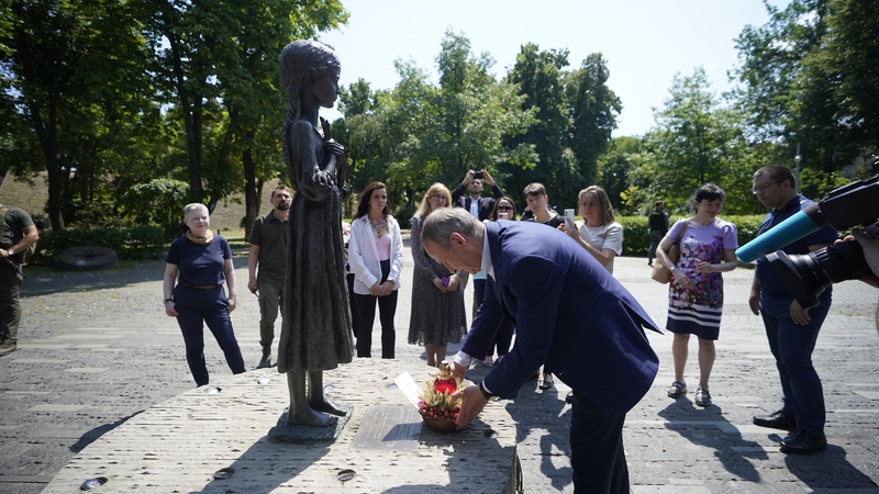 Micheál Martin lays a wreath at foot of the Bitter Memory of Childhood statue, which commemorates the victims of the Great Famine in 1932-33