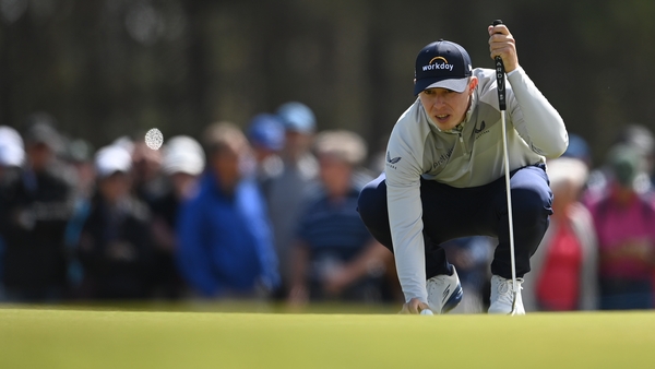 Matt Fitzpatrick lines up a putt