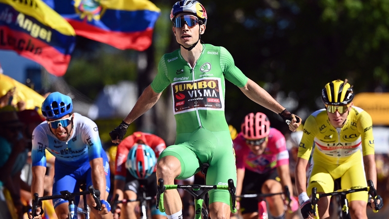 Wout Van Aert of Team Jumbo-Visma celebrates as he crosses the finish line
