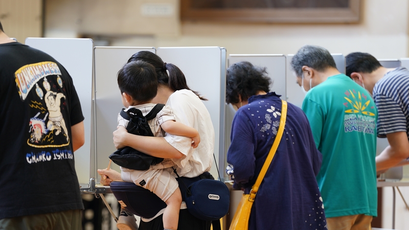 Voters this morning cast their ballots at a polling location in the Minato District of Tokyo, Japan