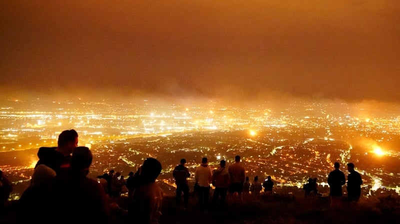 A view from Cavehill overlooking Belfast city of loyalist bonfires burning as part of the traditional Twelfth commemorations