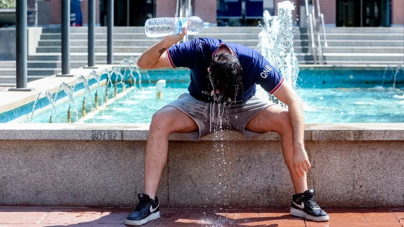 A man tries to cool down amid soaring temperatures in Madrid, Spain