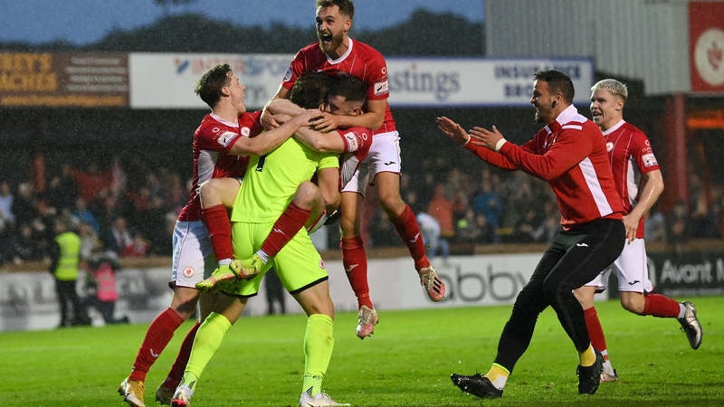 Sligo Rovers players celebrate with their goalkeeper Edward McGinty
