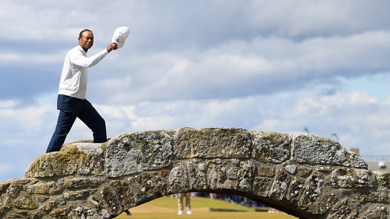 Tiger Woods salutes the crowd