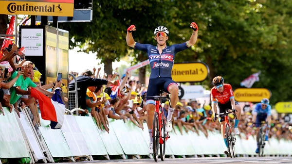 Mads Pedersen celebrates at the finish line