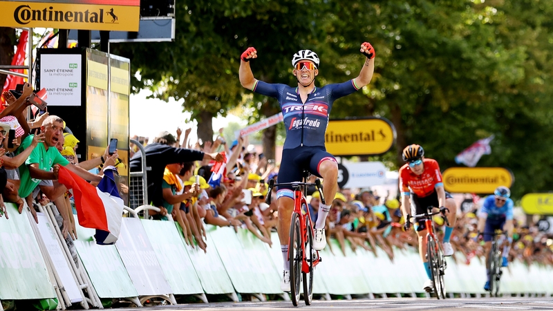 Mads Pedersen celebrates at the finish line