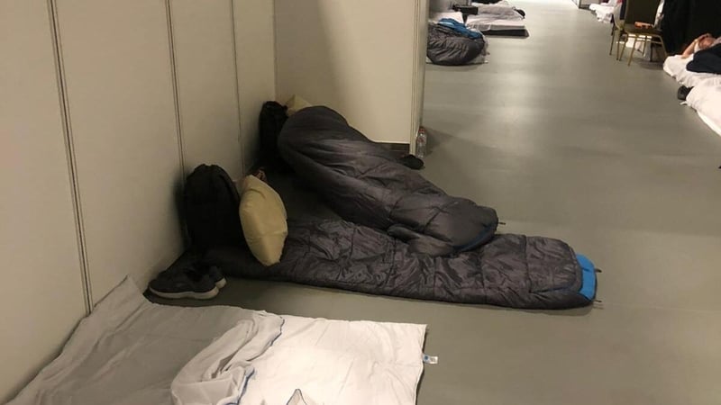Photos shared on social media by the Abolish Direct Provision Campaign shows sleeping bags on floors in corridors
