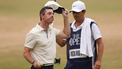 Rory McIlroy acknowledges applause from the gallery on the 18th hole at St Andrews on Sunday