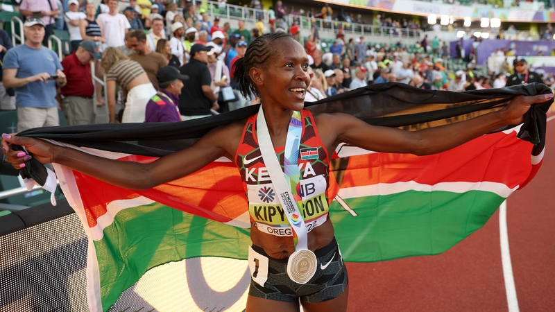 Faith Kipyegon celebrates becoming a world champion over 1,500m for the second time
