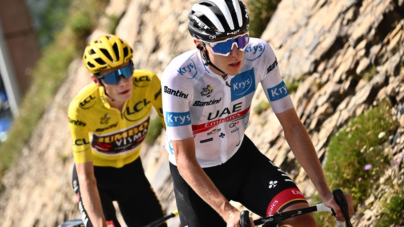 Tadej Pogacar (R) wearing the best young rider's white jersey and Jonas Vingegaard (L) gave chase on stage 17