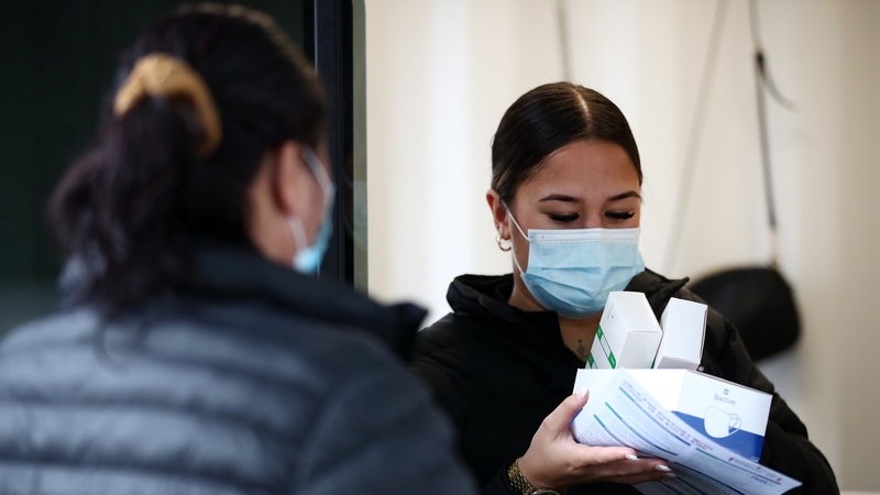 Breeze Harema-Watts gives out free antigen tests and masks at Te Whanau o Waipareira Trust local vaccination and testing centre in Henderson Auckland