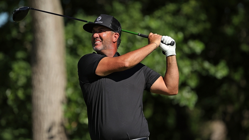 Scott Piercy plays his tee shot on the 11th hole at TPC Twin Cities in suburban Minneapolis