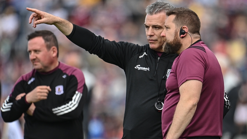 Padraic Joyce confers with coach Cian O'Neill (R) during the 2022 Connacht final