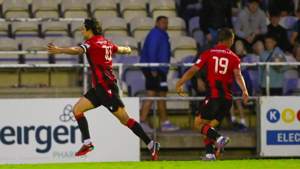 Sam Verdon of Longford Town celebrates his late winning goal against Waterford