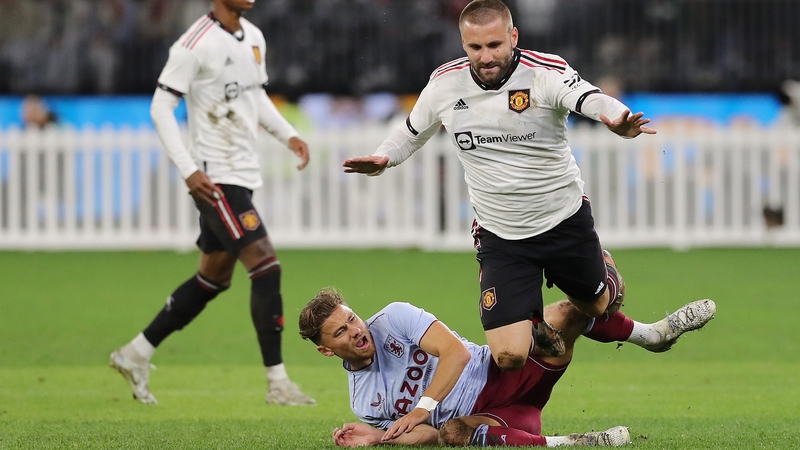 Matty Cash tackles Luke Shaw