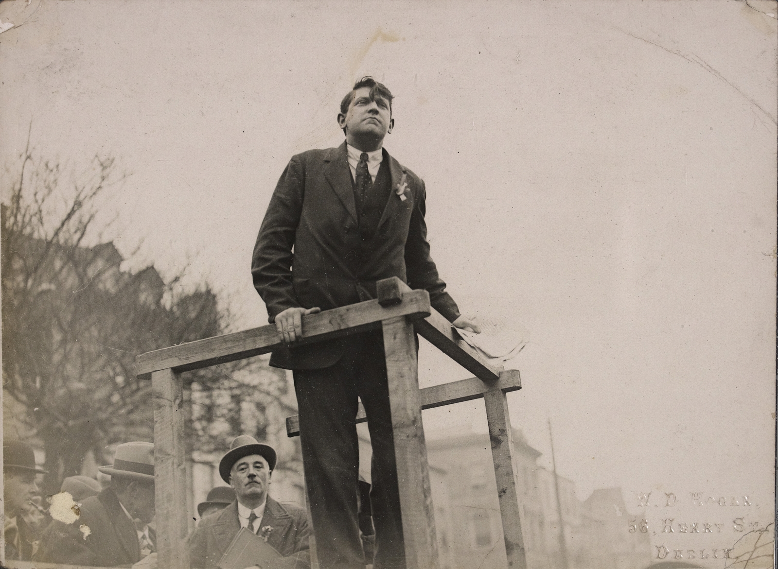 "The Defiant Chief": Michael Collins speaking from podium. Image courtesy of the National Library of Ireland